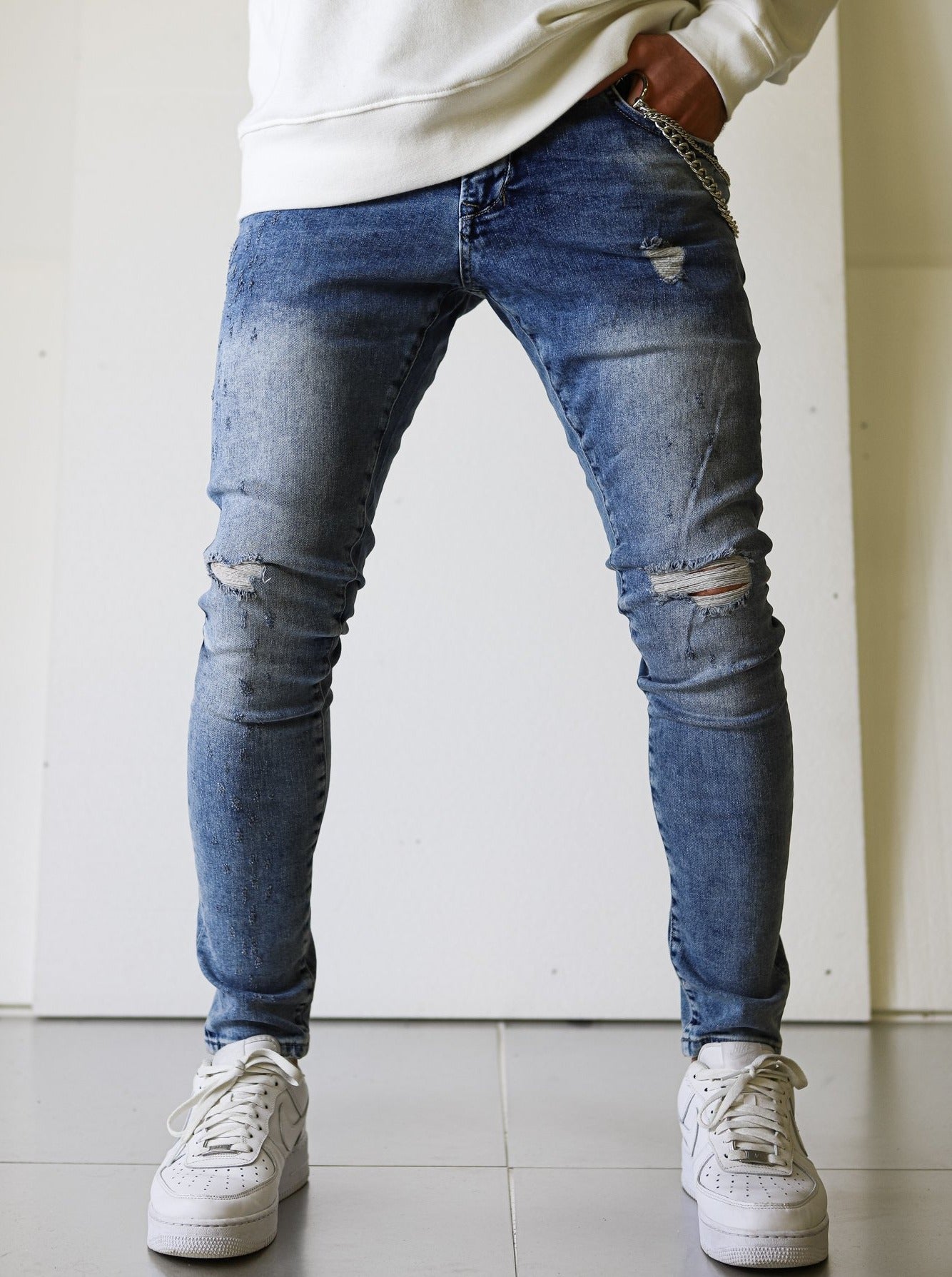 Blue Ripped Jeans With Chain - UNEFFECTED STUDIOS® - JEANS - UNEFFECTED