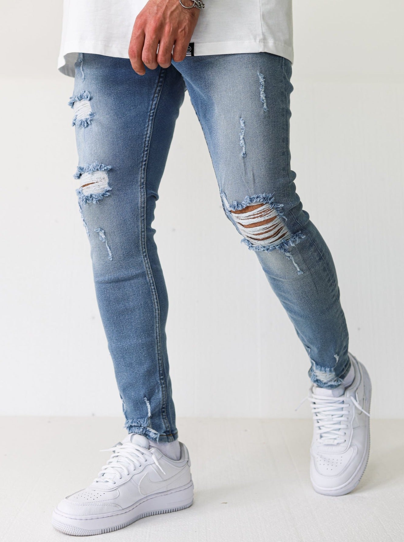 Distressed Ripped Light Blue Jeans - UNEFFECTED STUDIOS® - JEANS - UNEFFECTED