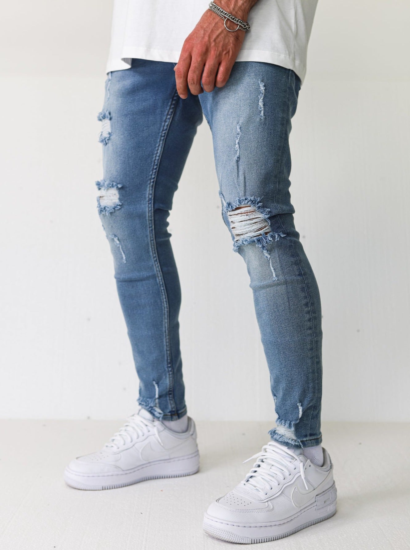 Distressed Ripped Light Blue Jeans - UNEFFECTED STUDIOS® - JEANS - UNEFFECTED