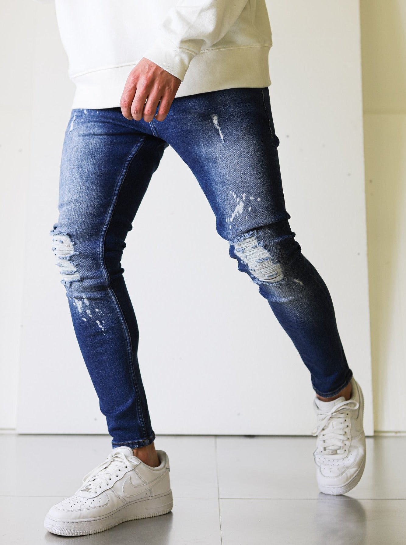 Ripped Bleached Blue Jeans