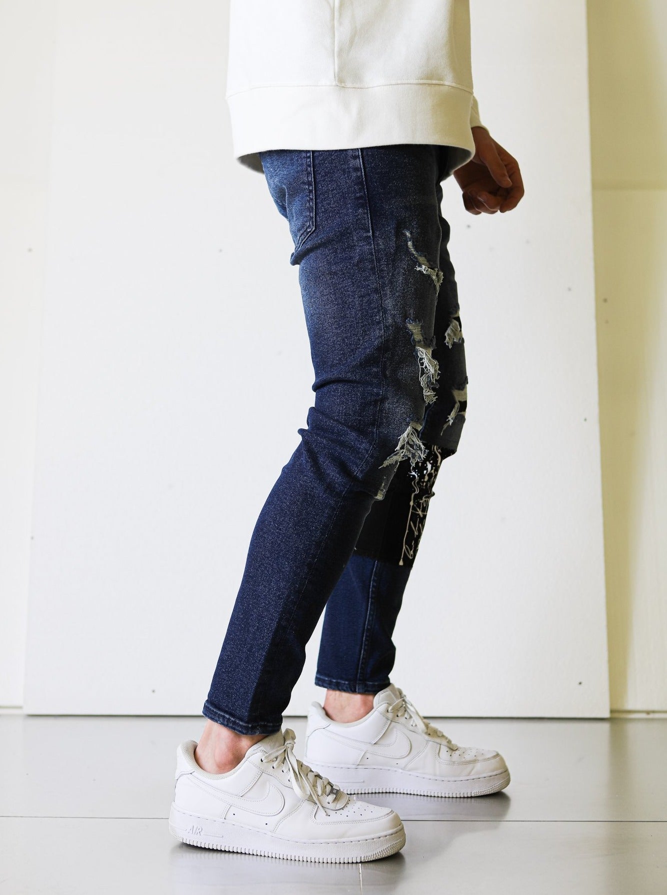 Signature Ripped Blue Jeans